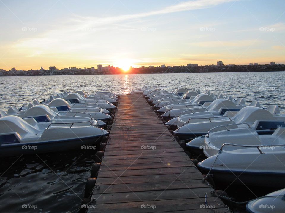 sunset autumn, October, Voronezh city, river, catamarans, pier