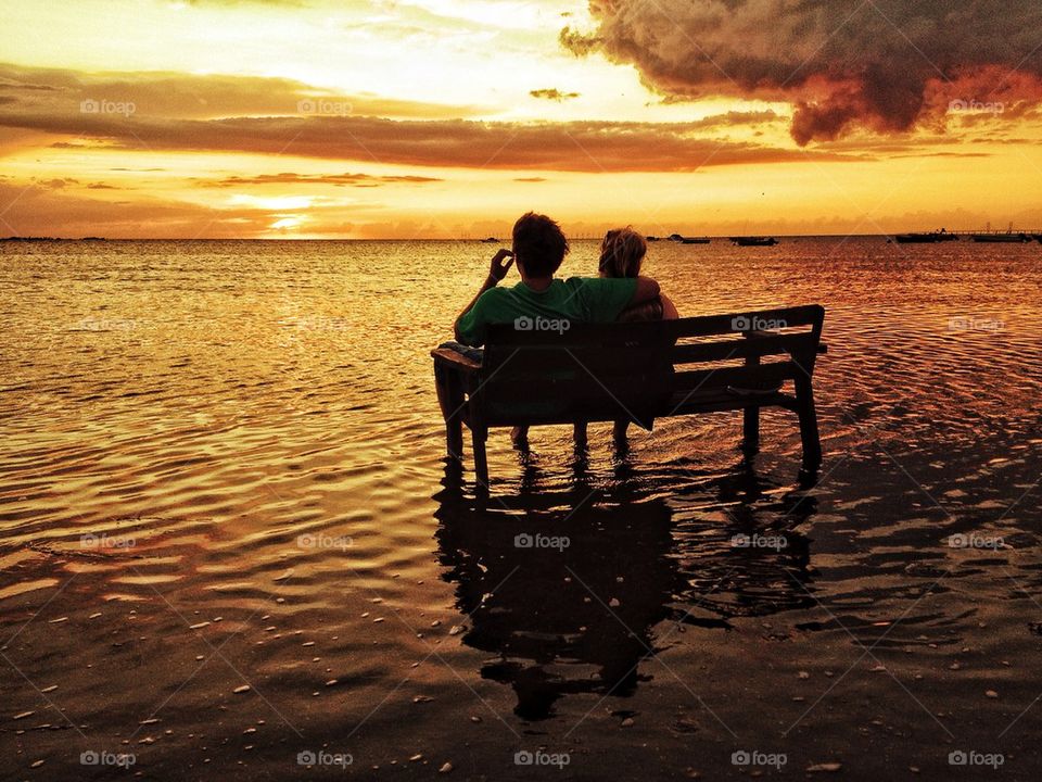 Peoples sitting on beach at beach