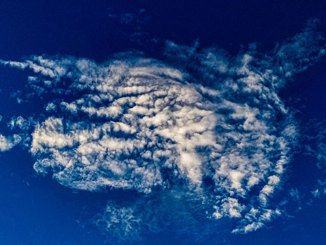 I want to show white clouds and blue sky in this photo.  The sky looks very beautiful with clouds and blue sky.