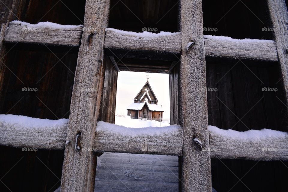 Stay faithful, stay warm. Frozen church in Norway.