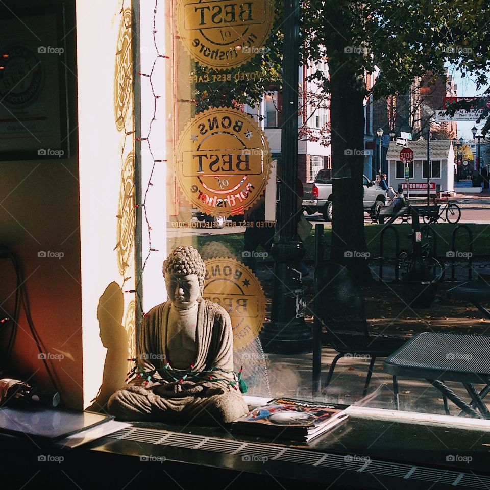 Buddha in Coffee Shop