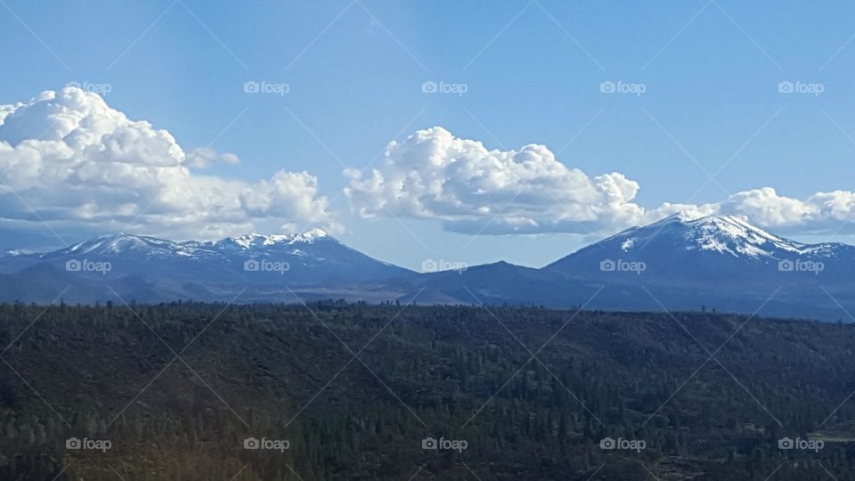 on our drive on hwy 299 from my home to a small town in California. Mt Lassen is across the valley. It had been raining days before it was nice having some blue skies. The clouds were too pretty not to take the picture.