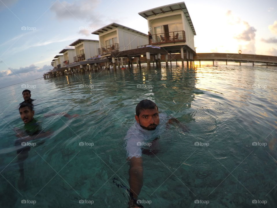High angle view of man swimming in sea