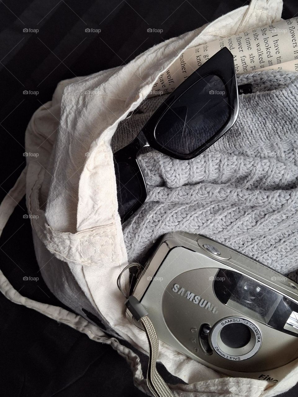 vintage macro photo of glasses and an old film camera