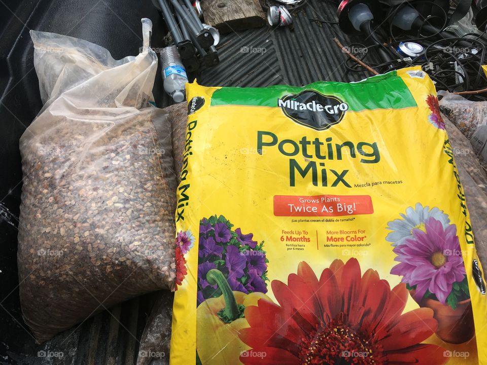 Time for some fun outdoors with a few projects in mind. I got a good start with potting soil and gravel.