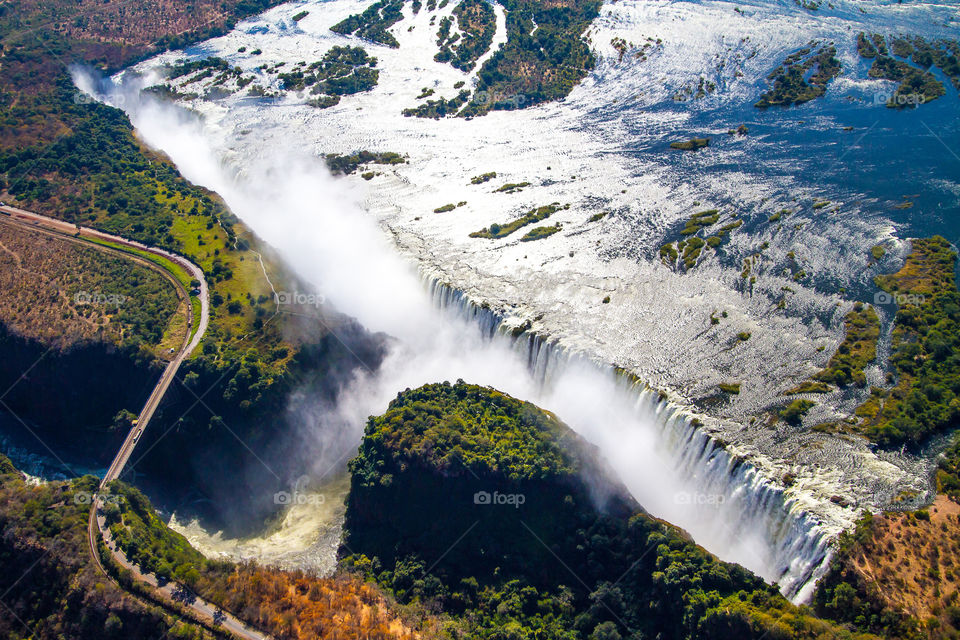Amazing landscapes - one of the seven natural wonders of the world from the air. Image of waterfall showing the magnificent waterfall in Africa