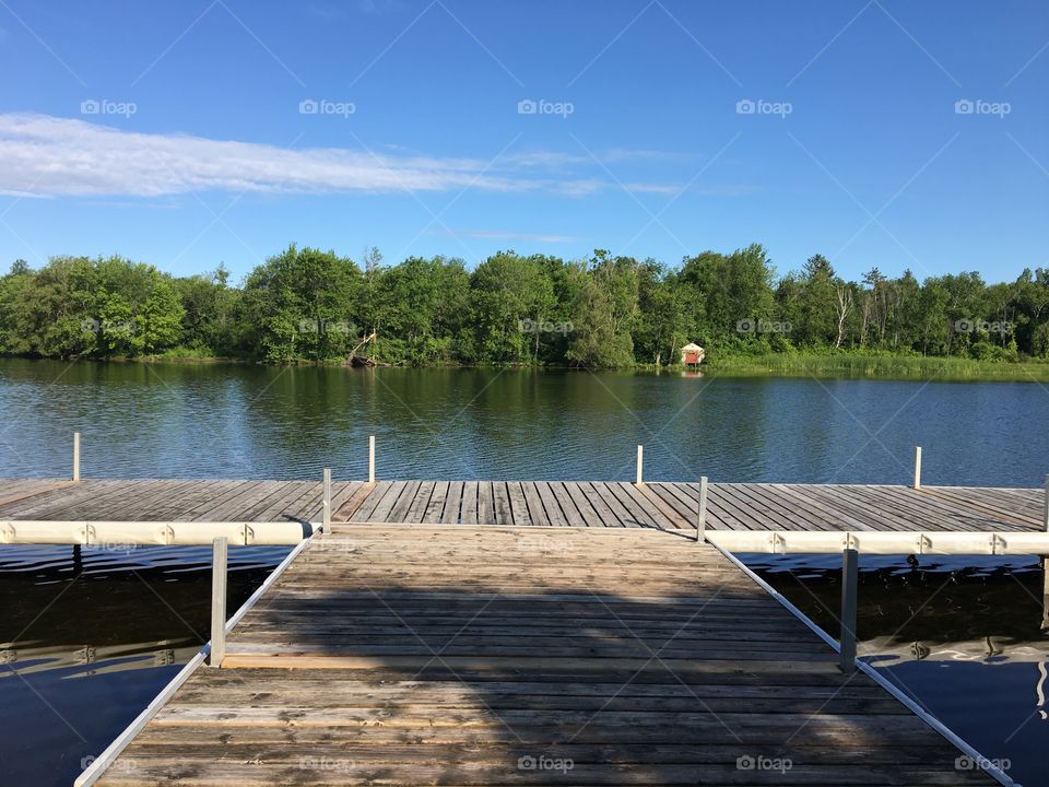 Sitting on the docks by the river 