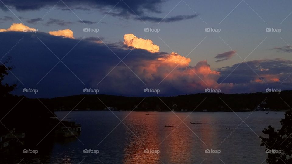 Scenic view of dramatic sky at lake