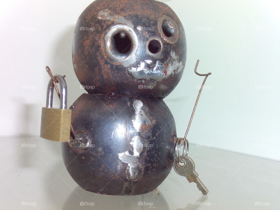 My other half is a welder and he made this for me :) We call him the rusty snowman. 