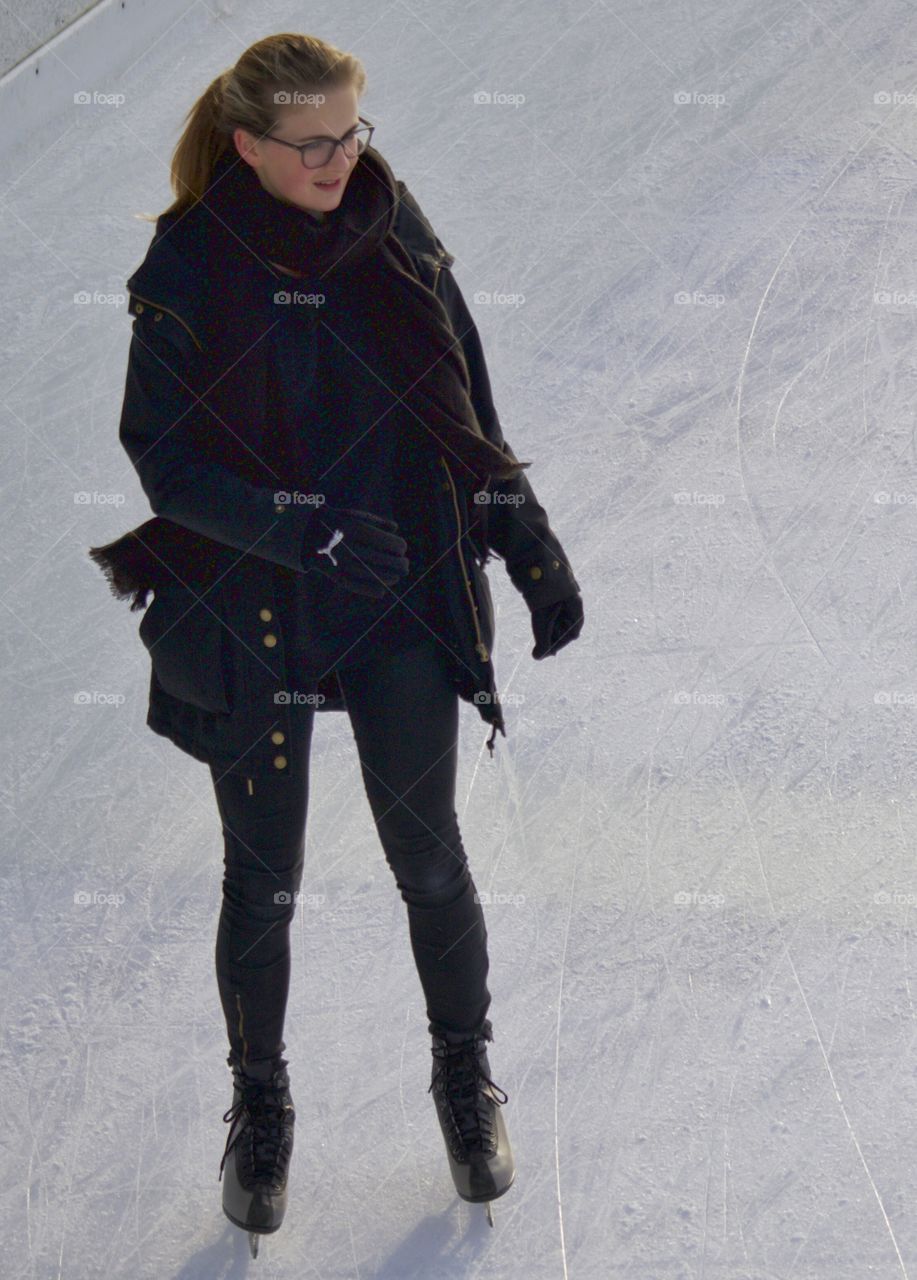 Young girl on ice rink