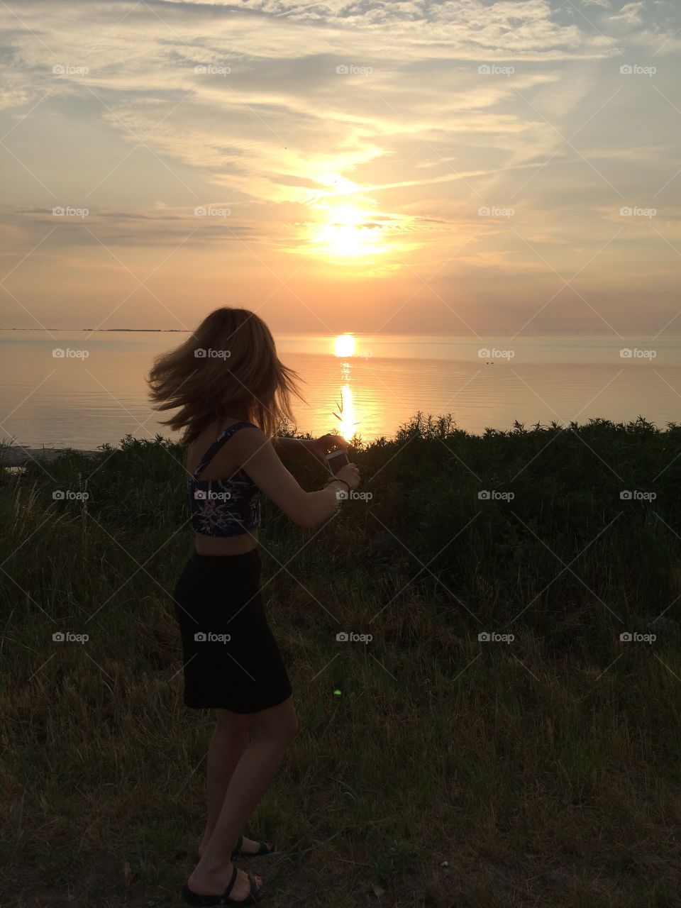 Girl in sunset