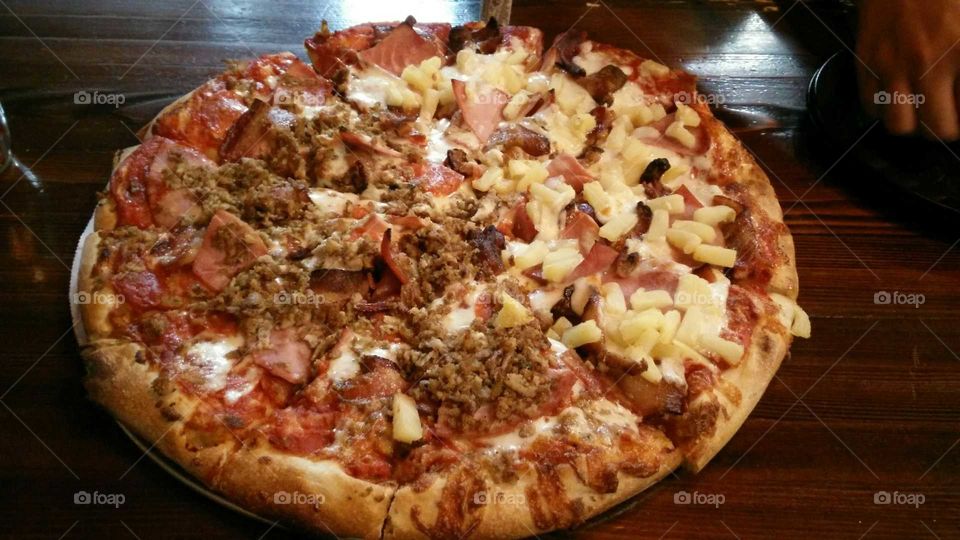 half Hawaiian half meat lover pizza