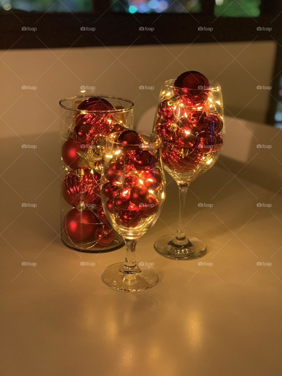 Christmas lights inside wine glasses 