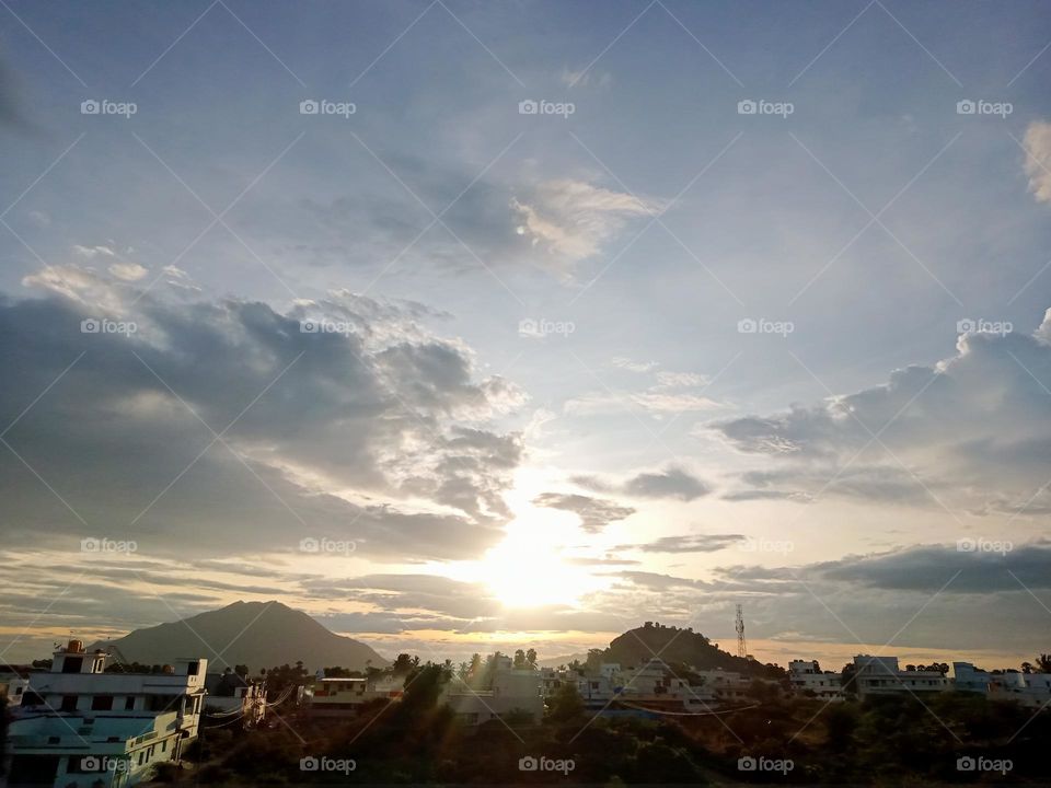 *Ravarma*  Golden yellow, beautiful sunset, lightning clouds, Happy mood