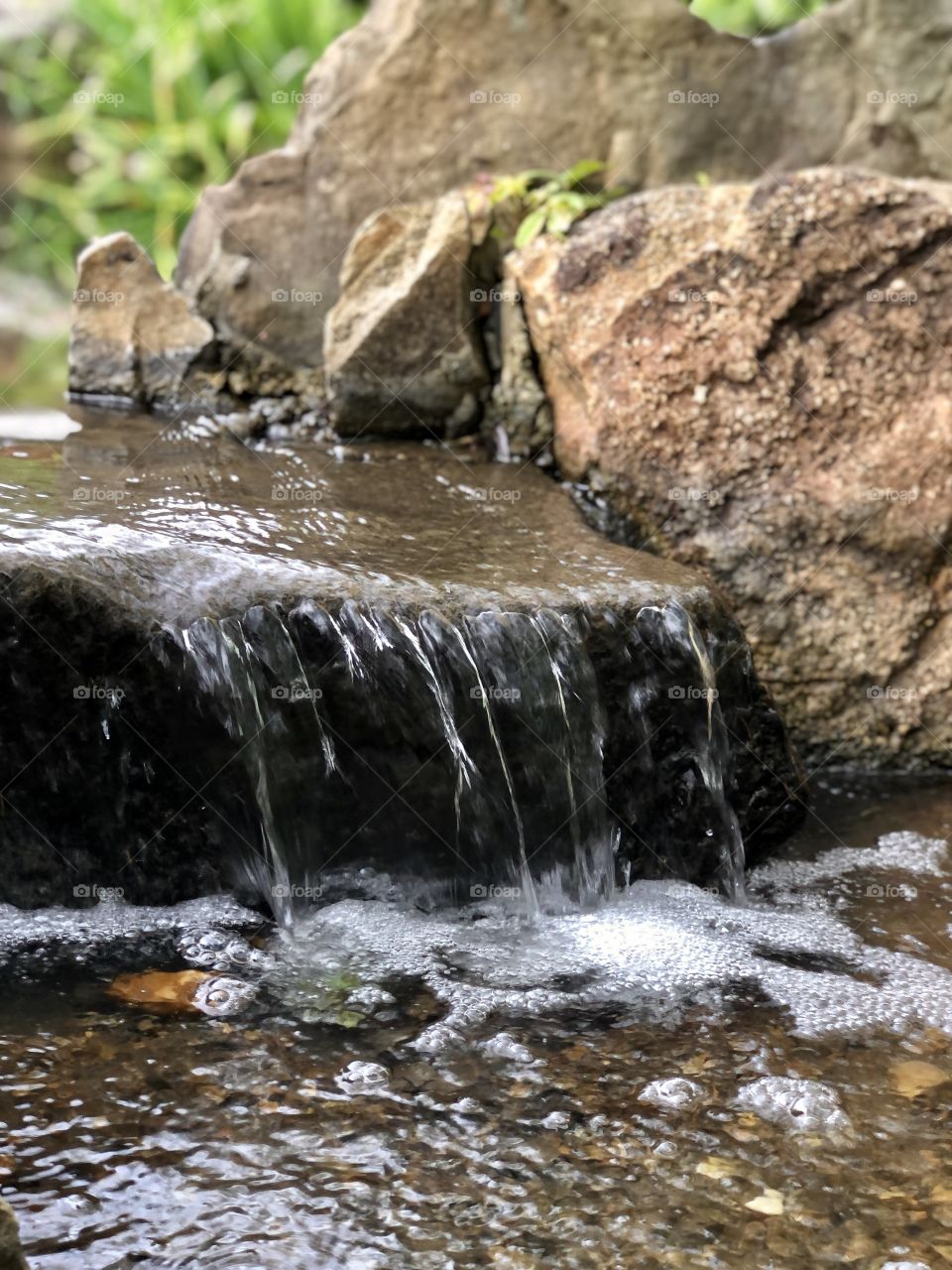 Waterfall closeup in Japanese garden 