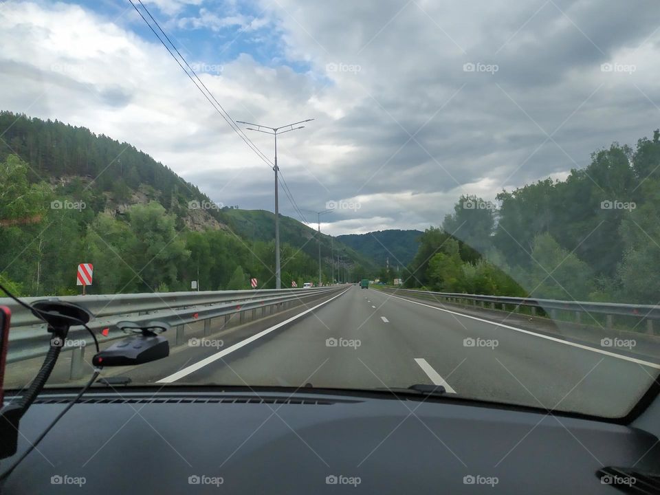 Road at the foot of the mountains