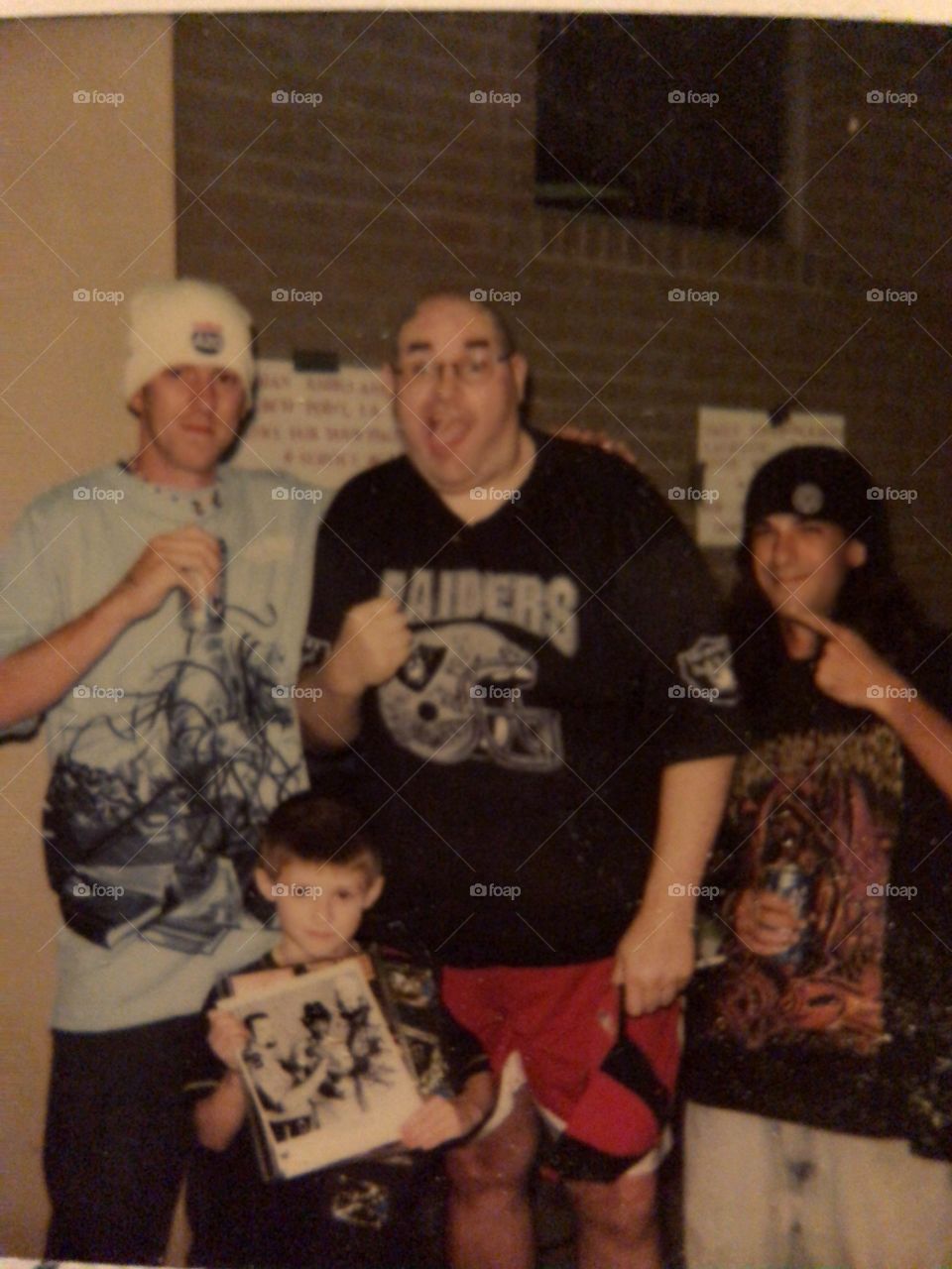 Here is a picture of three wrestling fans with the One Man Gang after we witnessed bob-wire, nail planks and broken fluorescent light bulb glass tube fighting. 