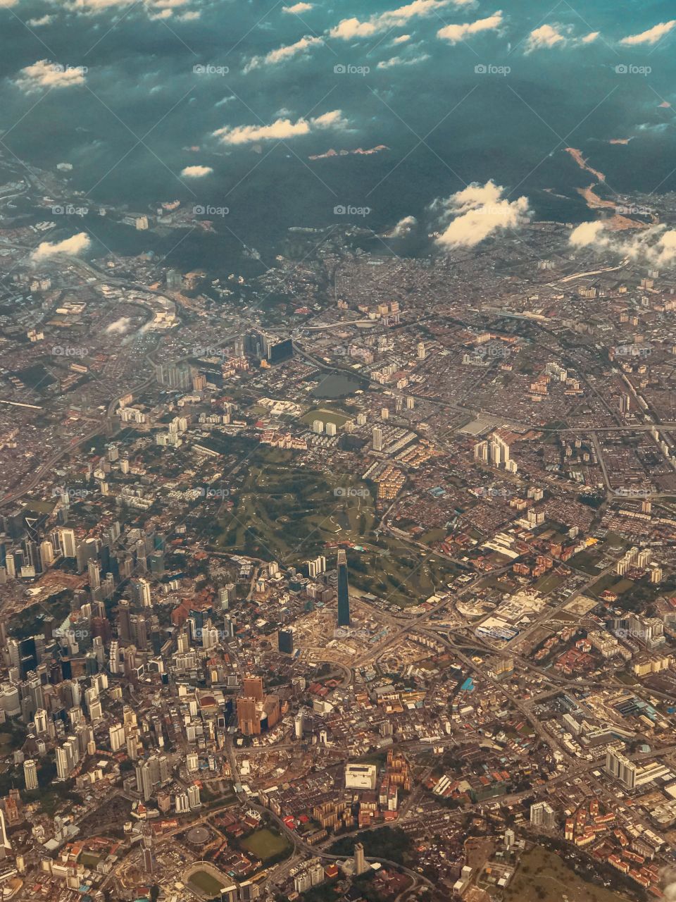 View of busy Asian capital; Kuala Lumpur from above 