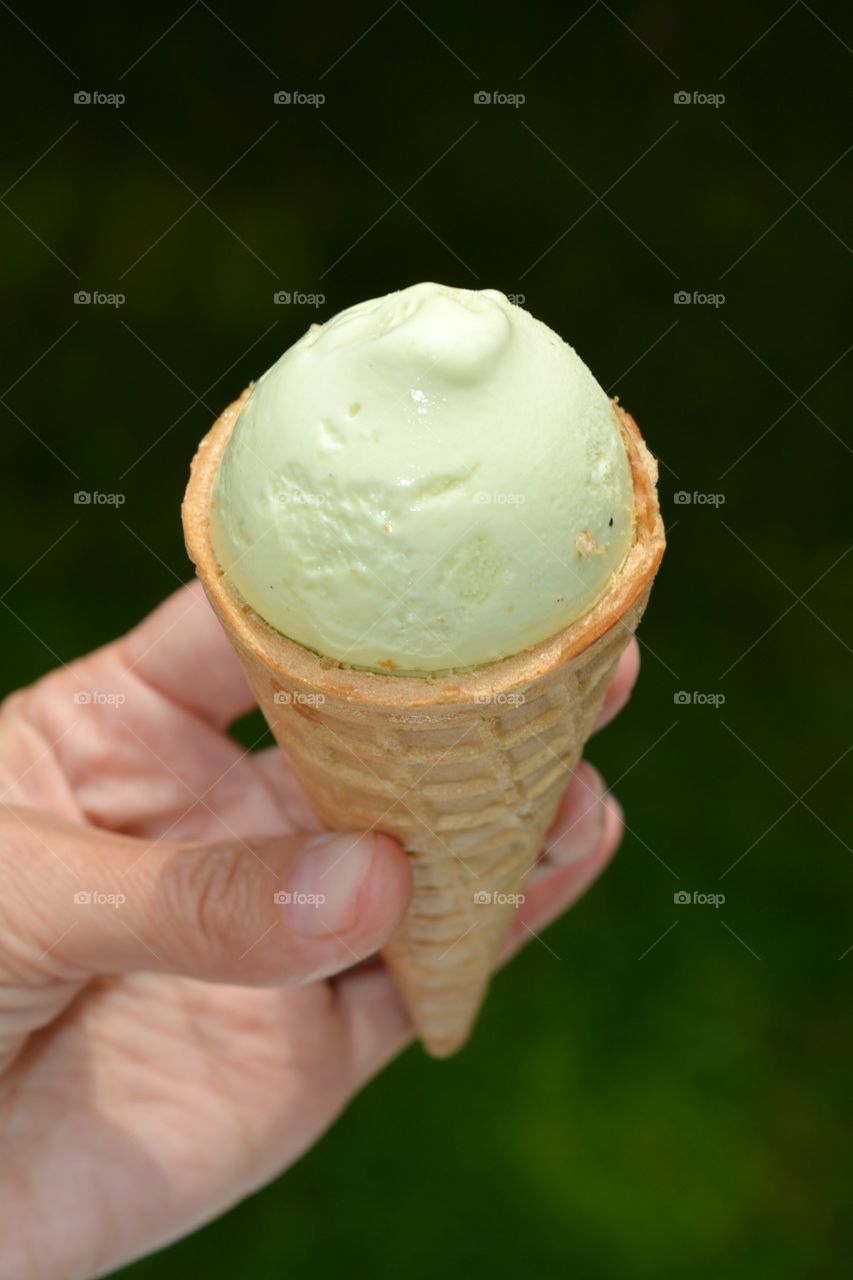 Person holding ice cream