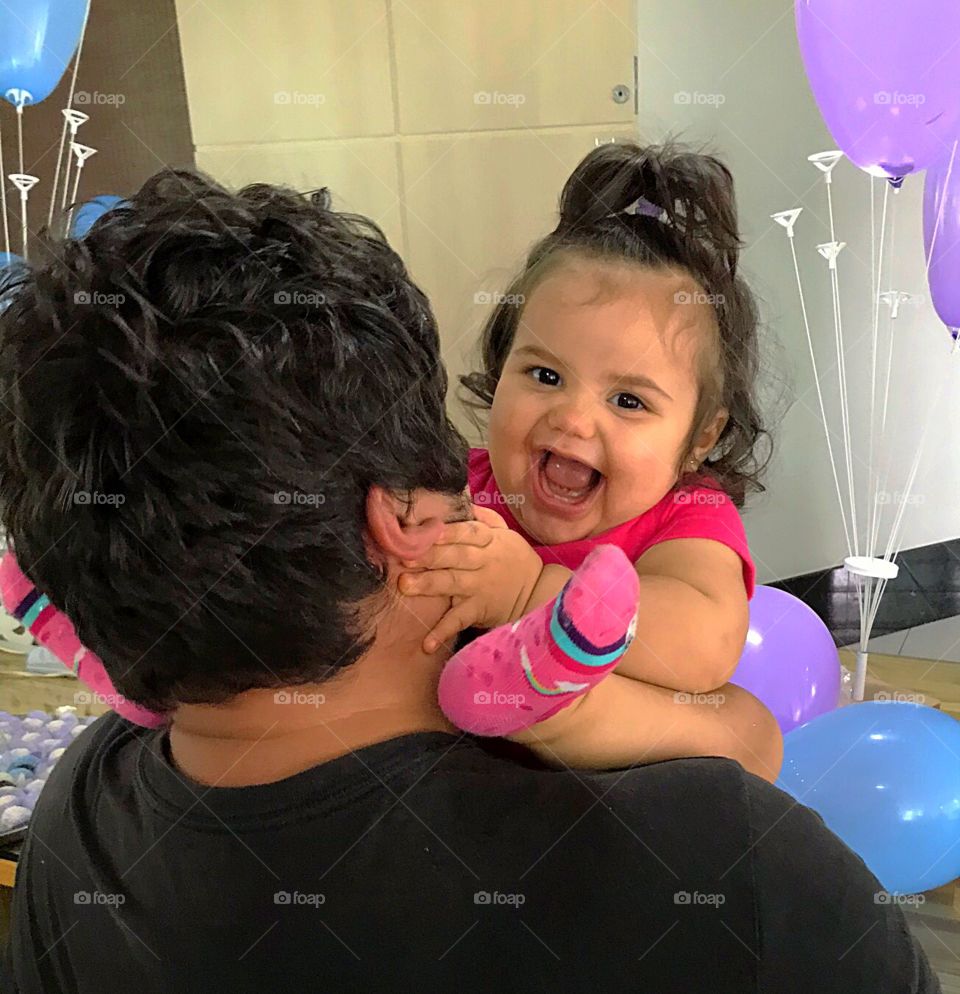 Squeezing daddy’s cheeks