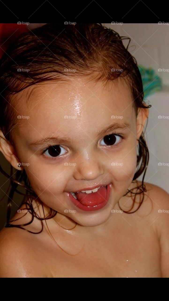 Little girl in bath tub