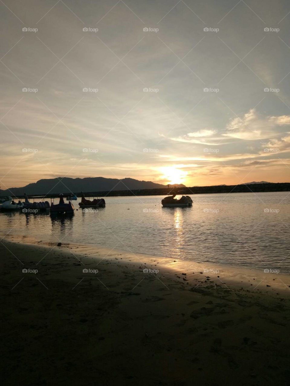 the beautiful view.  sunset in Ulele Beach,  Aceh.