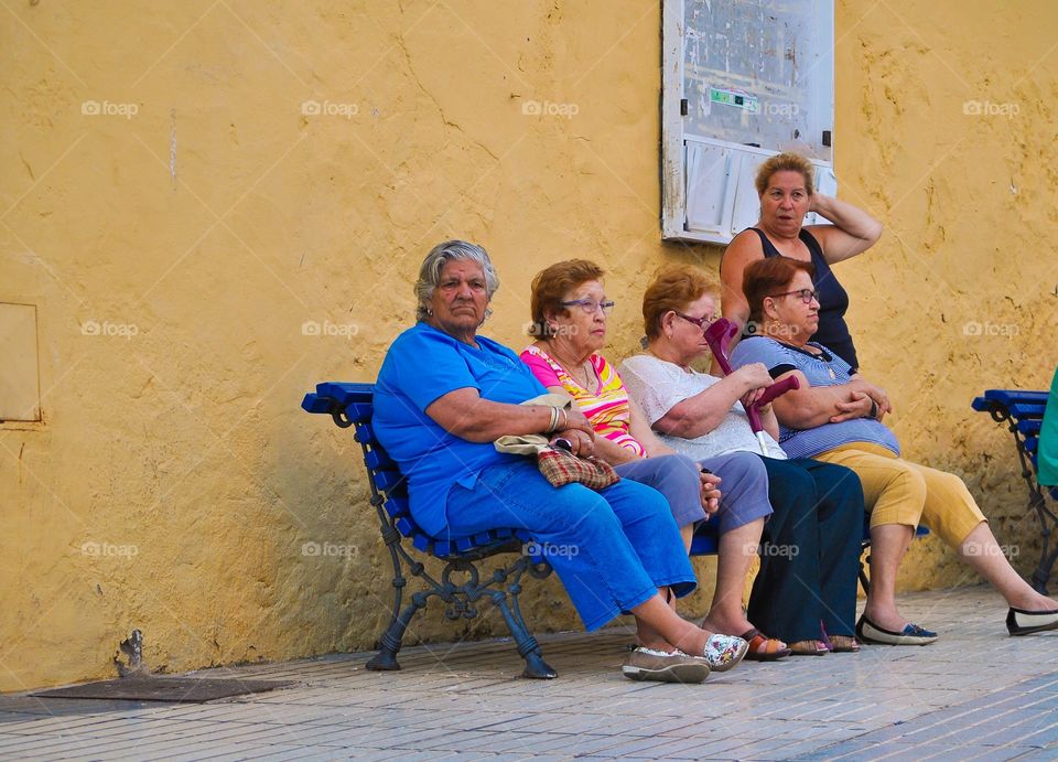 Women resting on a bench