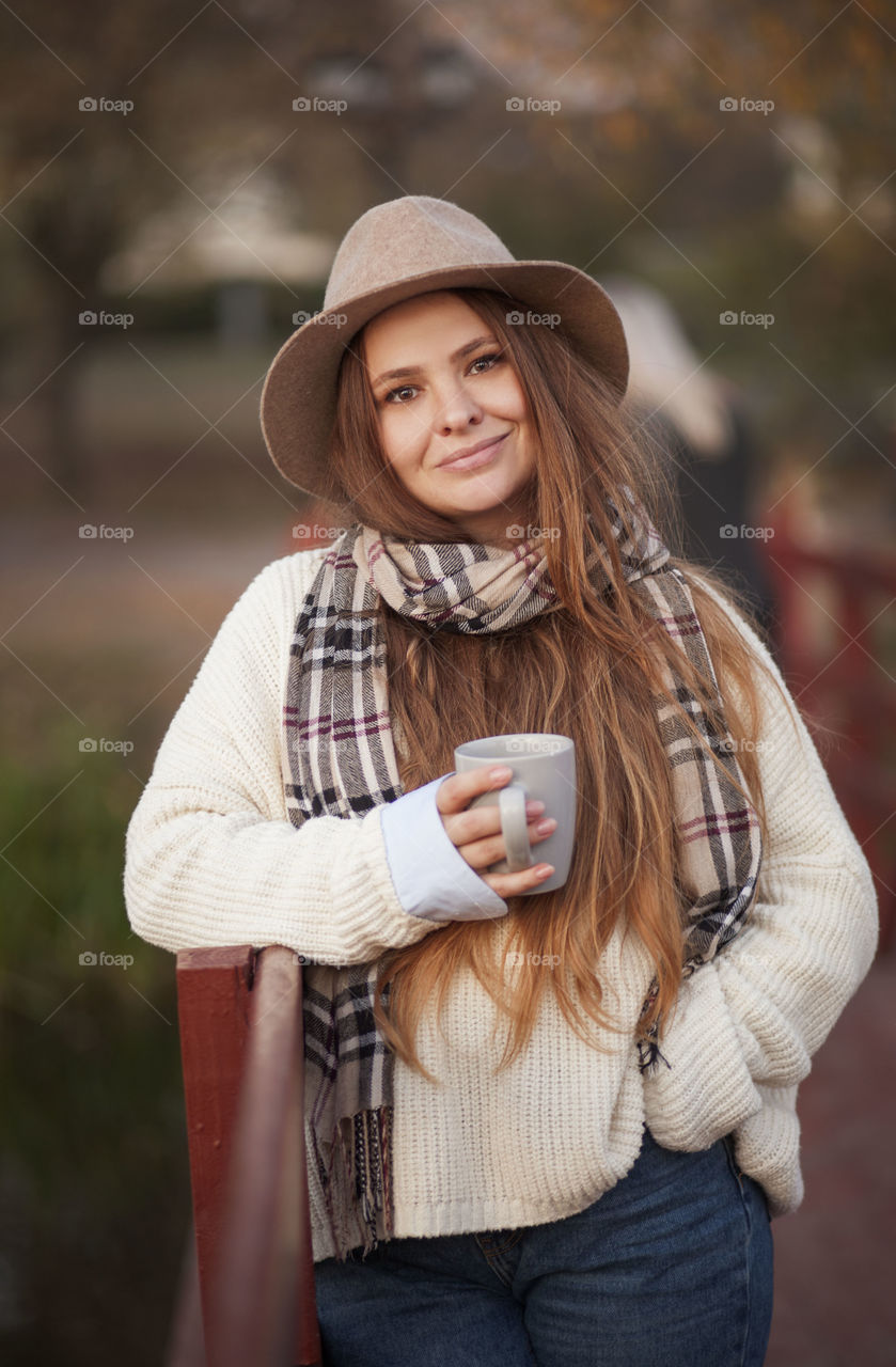 beautiful woman with a cup of coffee