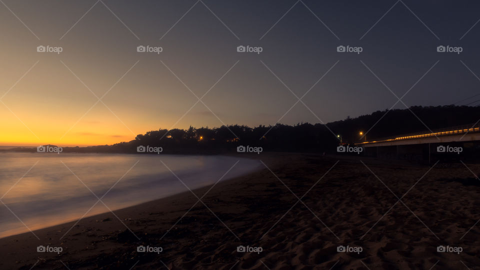 Beautiful dark sunset at the beach 