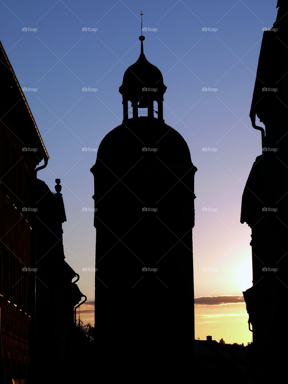 Silhouette of cityscape against sunset sky in Görlitz, Germany.