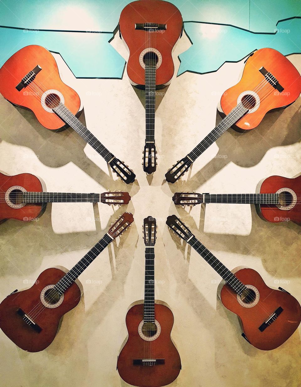 multiverse guitars hanging on the wall