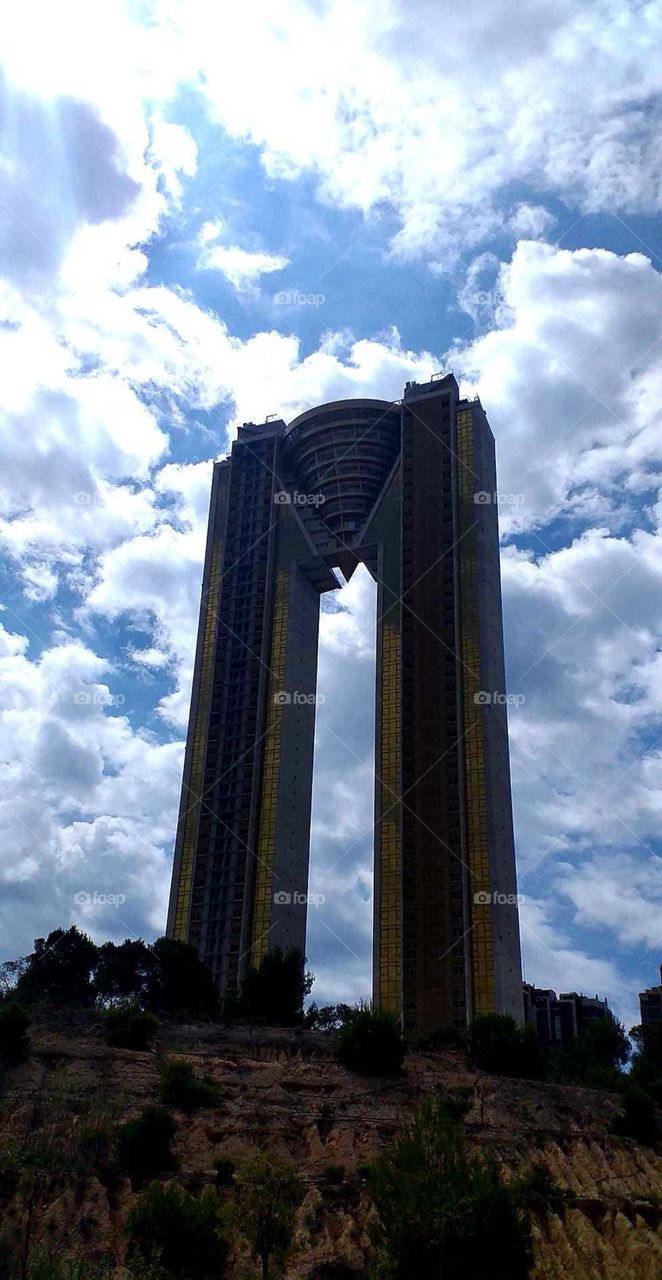 Building#skyscraper#sky#clouds#rocks#nature