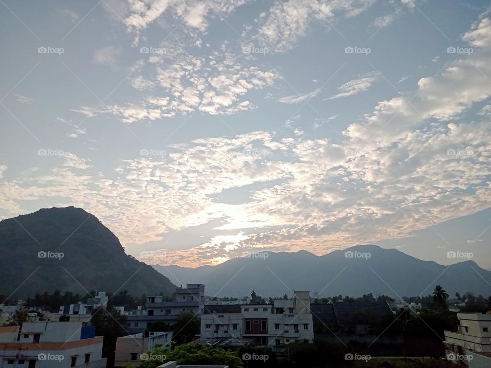 ravarma  like dolfin, mountain clouds