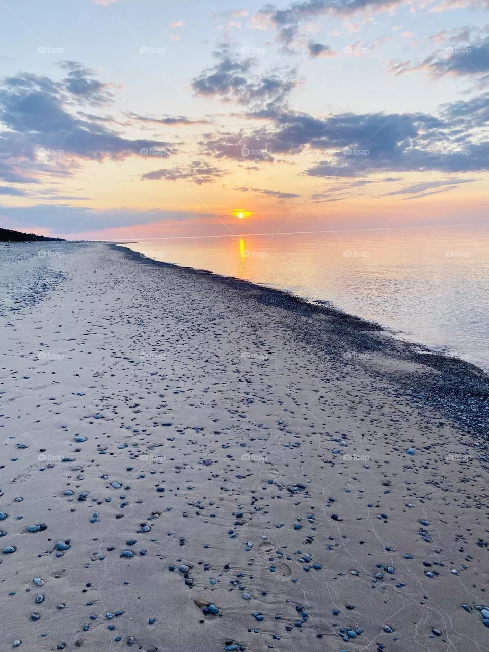 Sunset on a Lake Superior Sandy beach in Upper Peninsula Michigan 