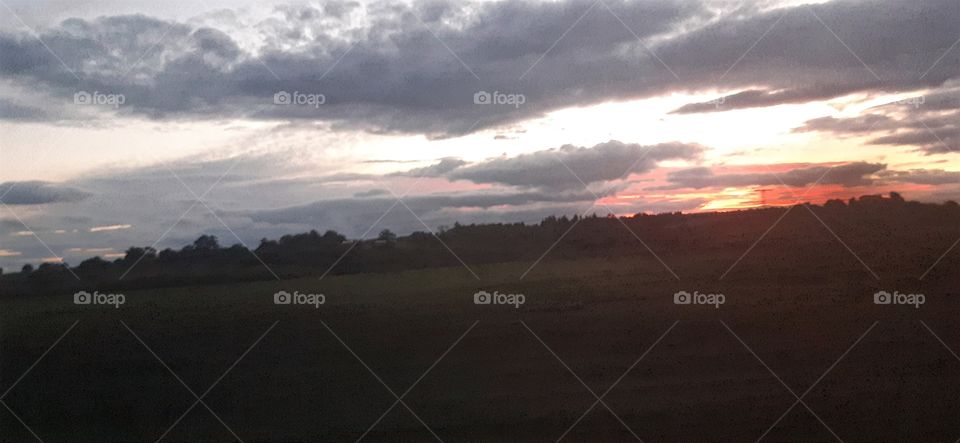 As the sun sets it creates a delightful view, a beautiful sunset.