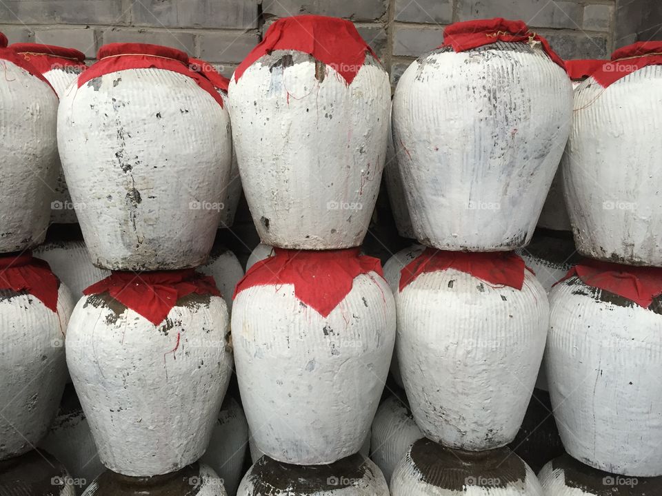 White Clay Jars with Red Tops