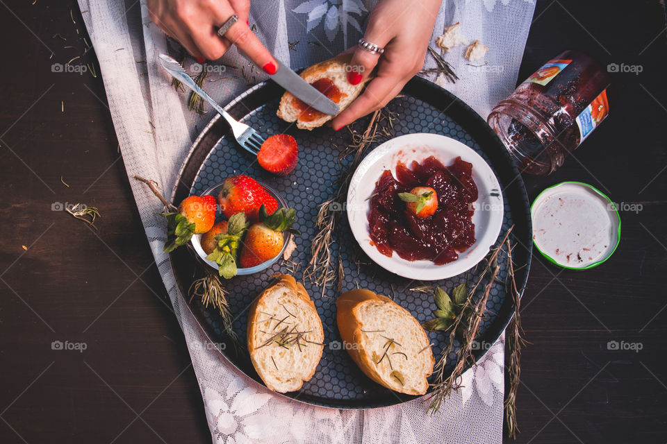 Red breakfast. Jam and strawberry with bread.