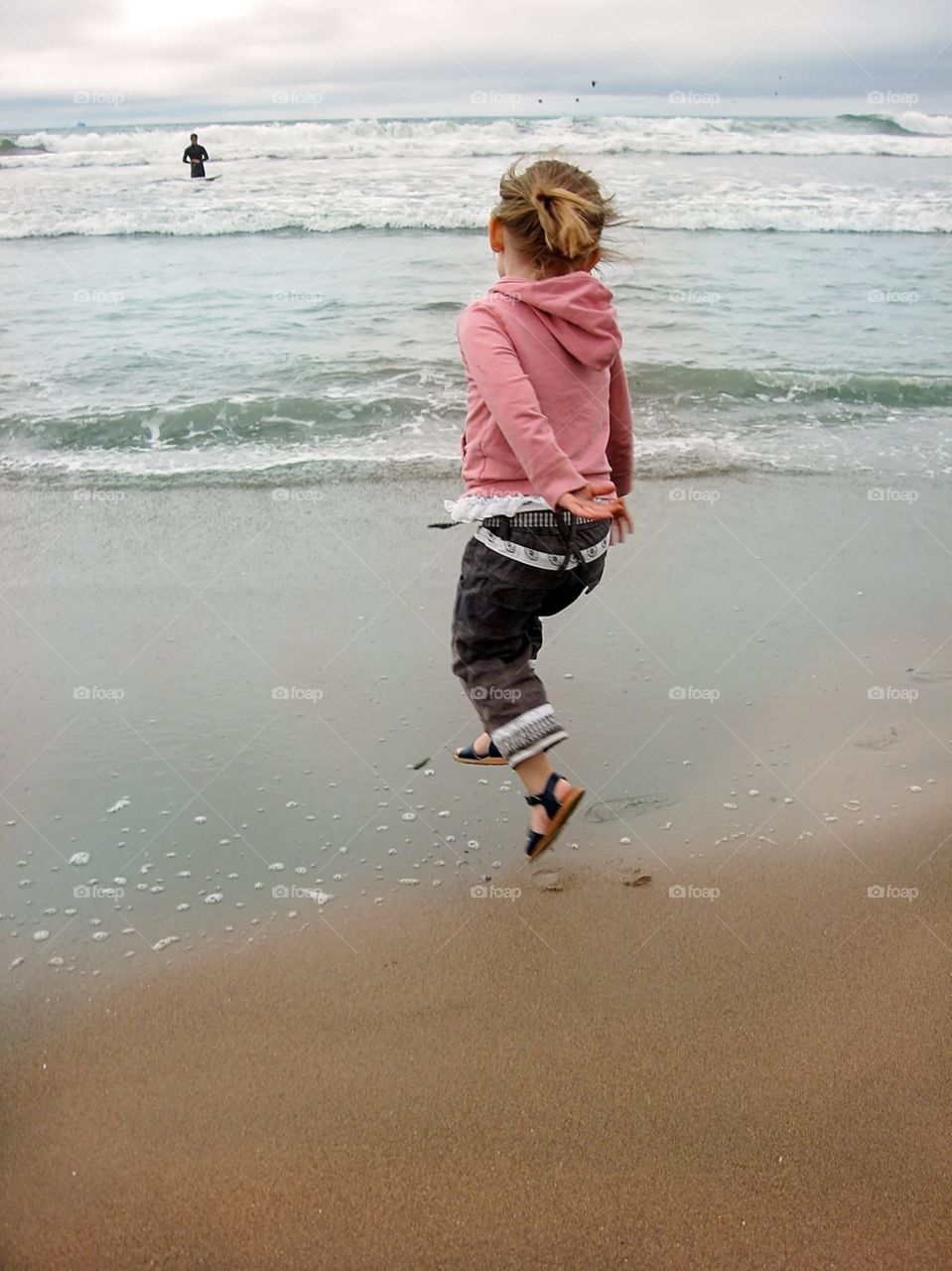 Jumping for joy at the beach