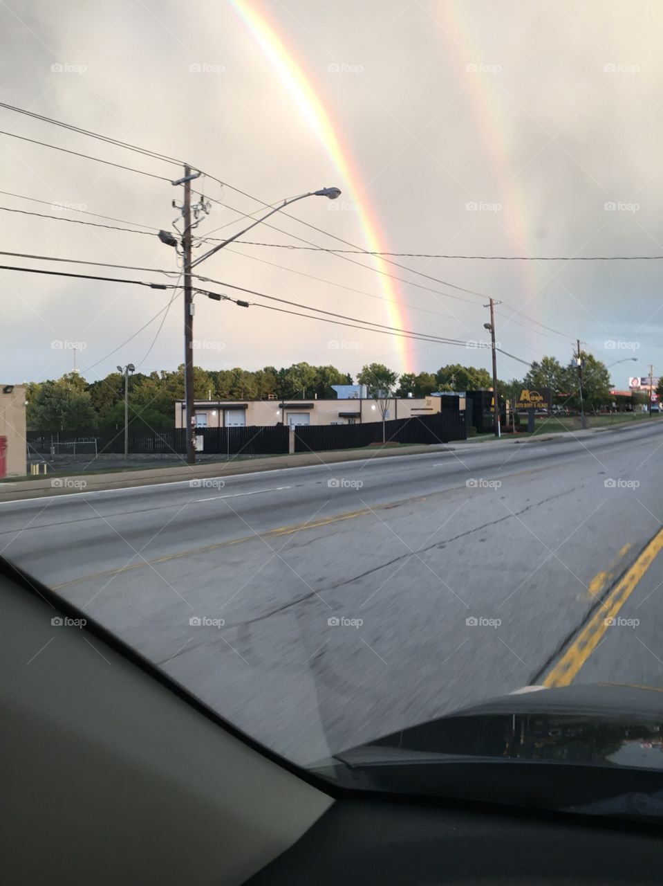 Double rainbow in the sky, while driving.