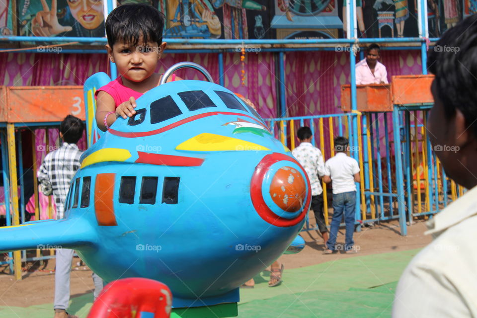 Kids enjoying in the amuzment park