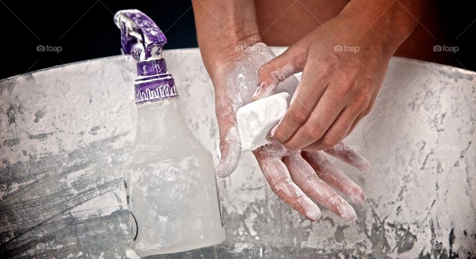 Gymnast chalking hands