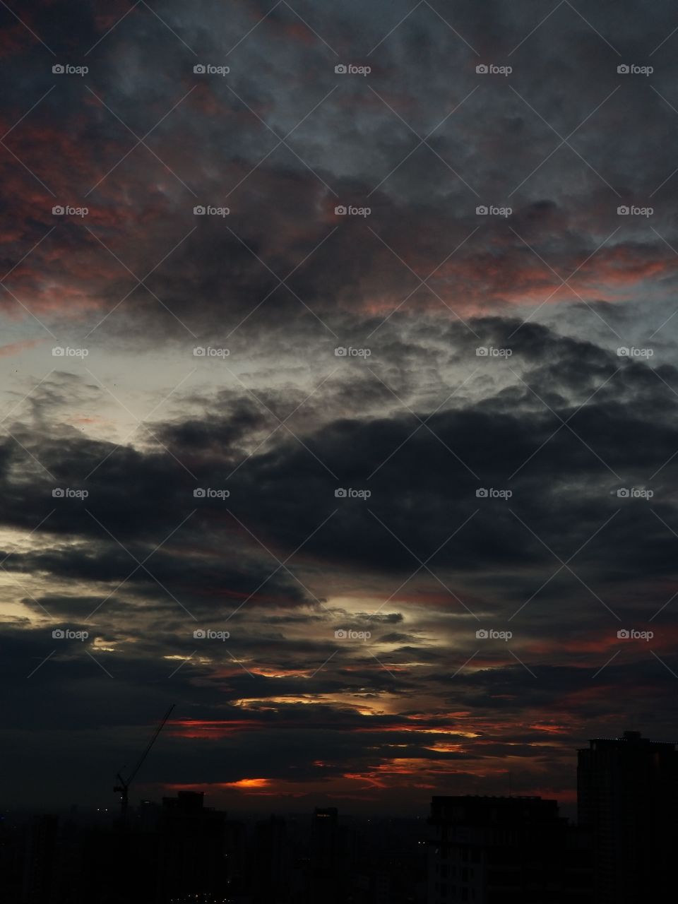 Sunset over Phnom Penh - photos from different vantage points - very cool sky and colors