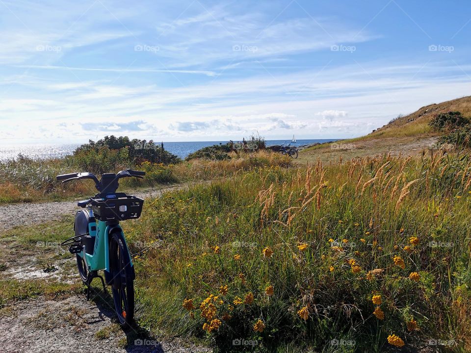 Bicycles, meadow and seaview