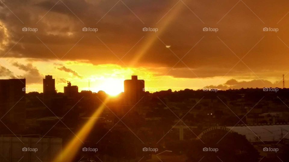 Silhouette of buildings during sunset