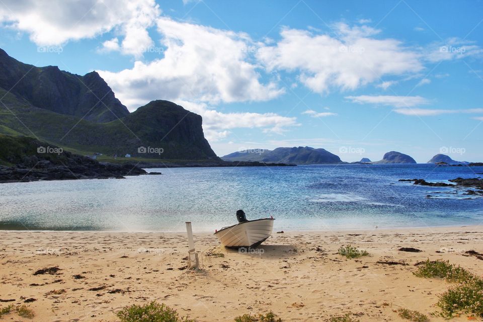 Scenic view of boat at beach