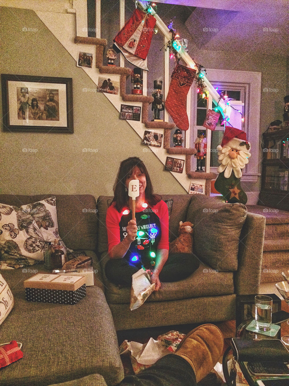 Woman sitting on sofa in christmas