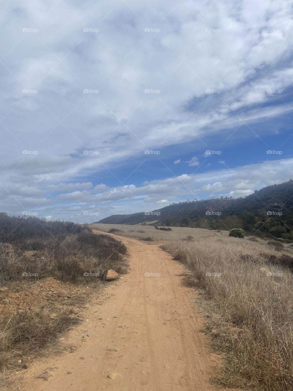 Dirt road with blue sky 