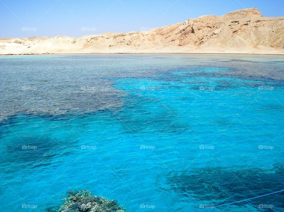 Reef in deep blue water