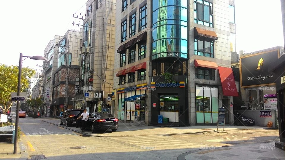 corner view of the city with shopping buildings