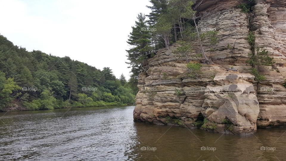 Wisconsin River Wisconsin Dells June trip rock formations with river view and tree's along banks